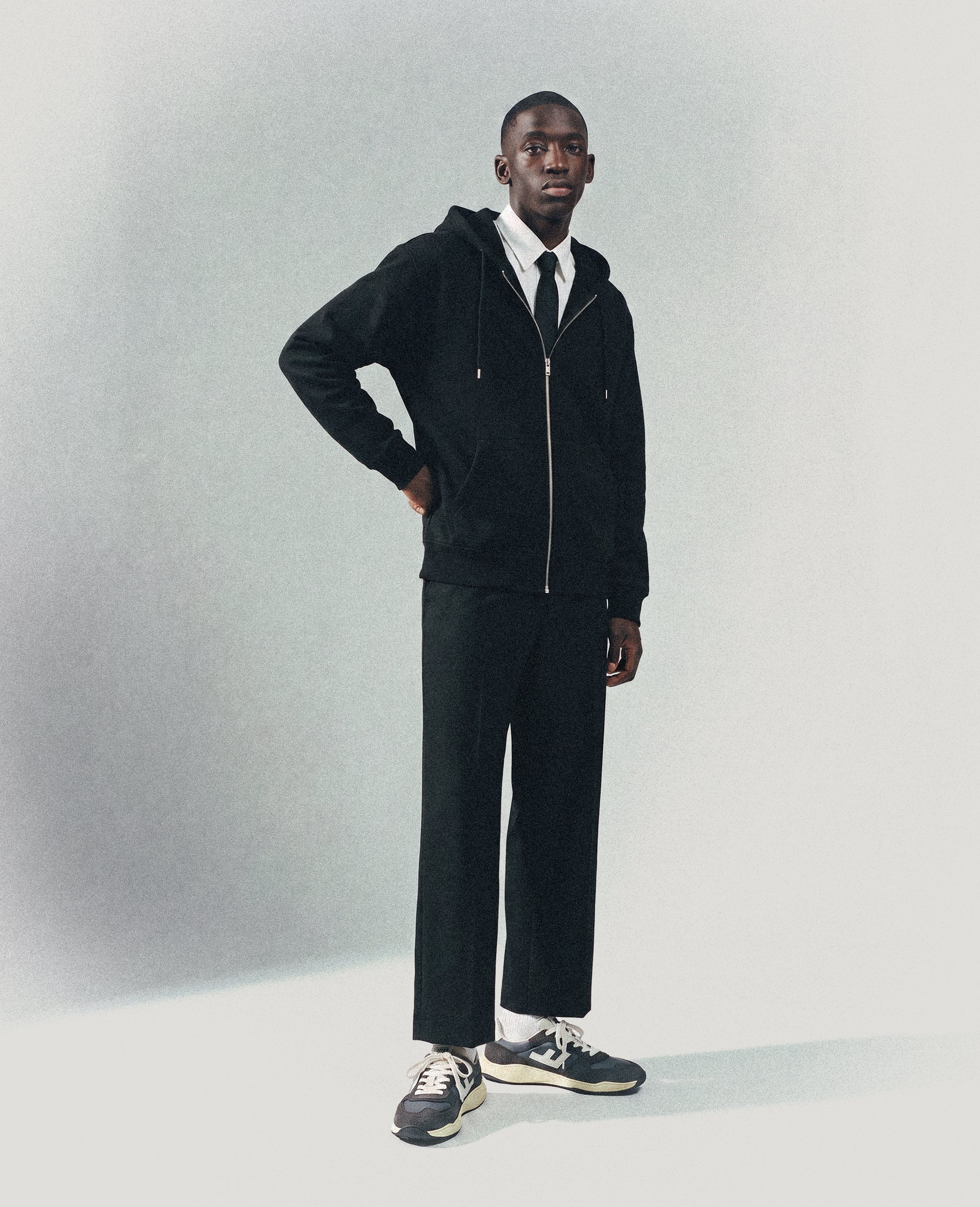 ZERO DROP Anthracite barefoot sneakers – styled with a black jacket and trousers