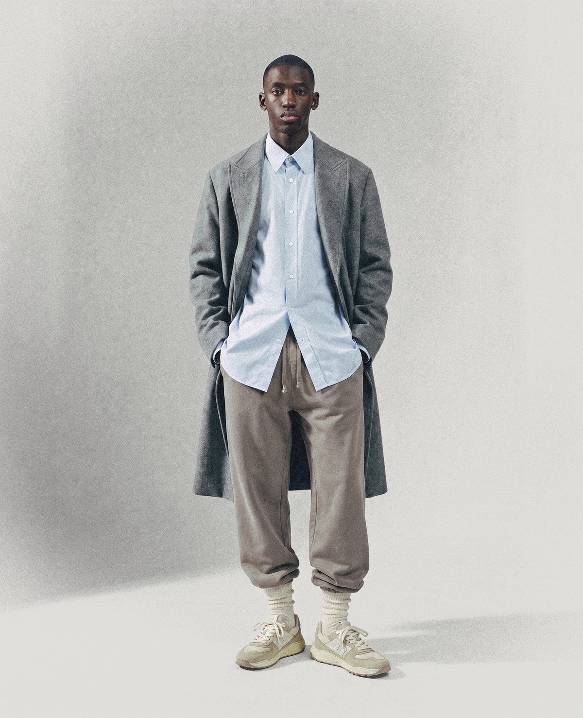 ZERO DROP Sand Olive barefoot sneakers – styled with a grey coat and light trousers